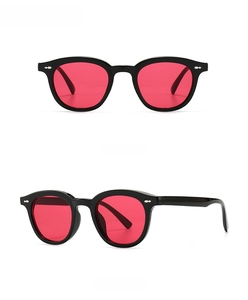 Front and side view of retro narrow black frame sunglasses with vibrant red lenses