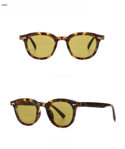 Front and 45-degree side views of leopard print retro sunglasses with khaki lenses
