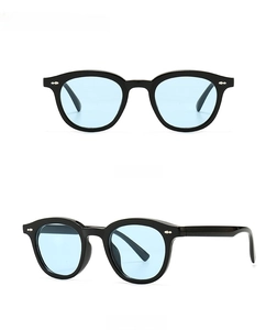 Front and side view of narrow black frame sunglasses with light blue transparent lenses