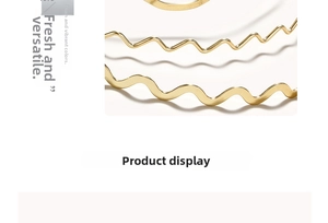 Detailed close-up of shiny gold wave metal headband showing smooth surface and texture