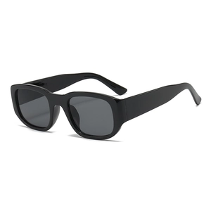 Unisex retro square black chunky frame sunglasses with dark grey lenses in 45-degree view