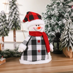 Christmas snowman tree topper with red black plaid hat and scarf holiday decoration