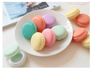 Detailed view of colorful macaron mini jewelry storage boxes in a decorative arrangement