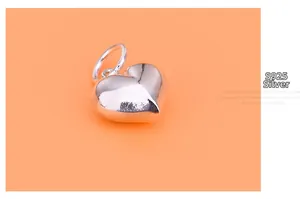 Detailed view of S925 sterling silver heart pendant with high-polished mirror finish surface