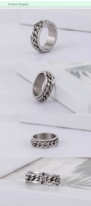 Detail view of rotatable Cuban chain ring in silver stainless steel from multiple angles