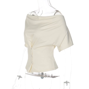 Detail of off-white off-shoulder slim top featuring front button closure and folded collar