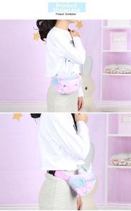 Detail of plush unicorn fanny pack showing gradient fur and embroidered eyelashes
