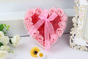 Detail view of 24 pieces heart-shaped soap flower gift box with pink and red roses