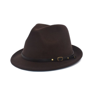 Detail of dark brown wool fedora hat featuring black faux leather band with gold studs