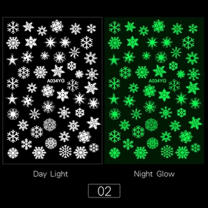 Luminous snowflake nail stickers showing white day effect and green night glow