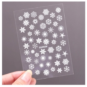Luminous winter snowflake nail art stickers with self-adhesive white decals on transparent film