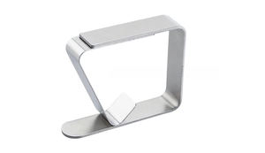 Macro detail of brushed stainless steel tablecloth clip with a matte silver finish