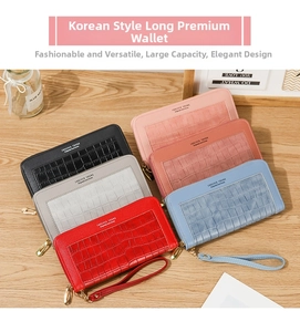 Detailed view of long zip wallets with stone texture in six colors and wrist straps