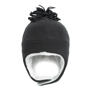 Close-up of black fleece winter trapper hat with soft white faux fur lining and top tassels