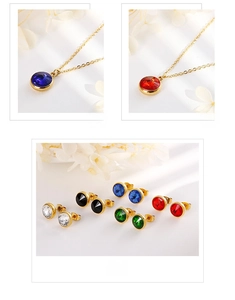 Detailed view of zircon jewelry set featuring blue and red pendants with gold studs
