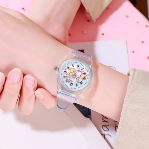 Wrist shot of transparent PVC children's watch featuring Sumikko Gurashi cartoon on white dial