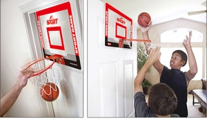 Kids indoor basketball hoop set with mini backboard and ball being used on a door