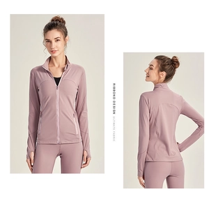 Detail view of quick-dry sports jacket with thumbholes and slim fit design for women