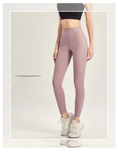 Dettaglio dei leggings fitness a vita alta con stampa Urban Sports in rosa malva scuro