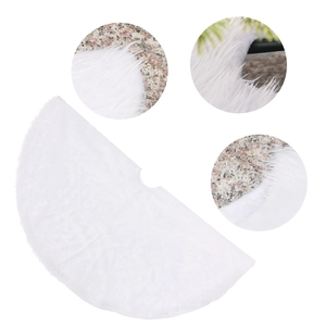 Plush white faux fur Christmas tree skirt with round opening for festive holiday decor
