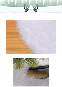 Close-up of soft white faux fur Christmas tree skirt texture on wooden floor