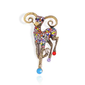 Exquisite sheep brooch with colorful rhinestones and gold alloy spiral horns on white base