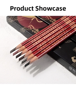 Detail of red wooden eyebrow pencils with sword-cut tips and black elegant gift box