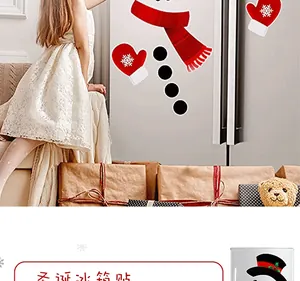 Detailed view of kids DIY snowman fridge magnets set featuring red scarf and gloves