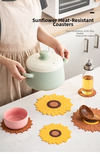 Detailed close-up of sunflower-shaped silicone heat-resistant placemats and coasters