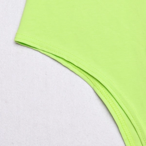 Detail of bright green elastic cotton fabric with precise double-needle hem stitching