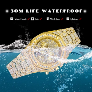 Detailed view of luxury gold diamond watch with 30M life waterproof rating and splash proof