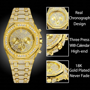 Detailed macro view of 18K gold plated iced out watch dial with chronograph features