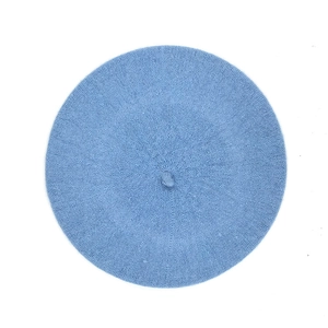 Classic light blue wool beret hat for women with soft knitted texture on white background