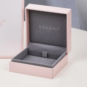 Premium pink jewelry gift box with grey velvet lining and brand logo for necklaces