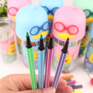 Close-up of vibrant washable watercolor pens with fine tips and cartoon penguin caps