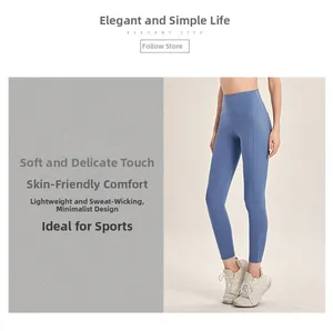 Detail of high-waisted blue yoga pants featuring soft touch and breathable fabric texture