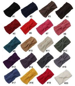 Close-up of knit headbands in 20 colors showing corn kernel texture and bow design