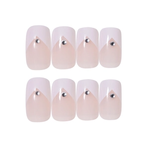 French V-tip press-on nails in pink with rhinestone accents and square-oval shape