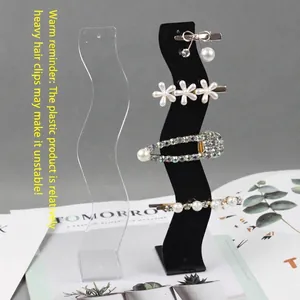S-shaped wave display stand for hair clips and jewelry in acrylic and black plastic