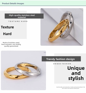 Detail of twisted Mobius rings in gold and silver finish made of durable stainless steel