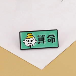Nostalgic rectangular enamel lapel pin with green background and cartoon fortuneteller