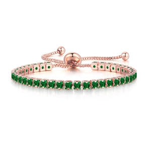 Detail of adjustable rose gold bracelet with emerald green square cubic zirconia stones