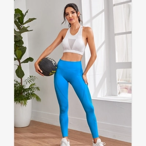 Damen nahtlose blaue Yogahose mit hoher Taille und weißes Sport-BH-Set fürs Gym