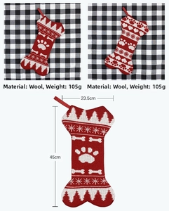 Detailed view of red and white knit bone-shaped pet Christmas stocking with snowflake patterns