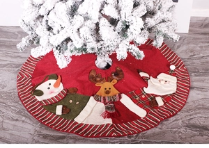 Close-up of a 120cm red Christmas tree skirt with knitted snowman and reindeer patterns