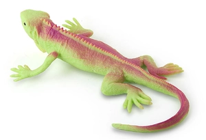 Detailed top view of a lifelike iguana toy with vibrant green and purple spinal ridge