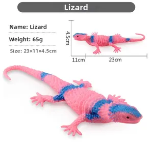 Pink and blue striped toy lizard replica with size specifications 23x11x4.5cm
