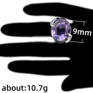 Classic silver-colored ring featuring a large 9mm purple oval zircon and side micro-pave crystals