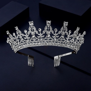 Detailed macro view of silver bridal crown with glittering crystals and side combs