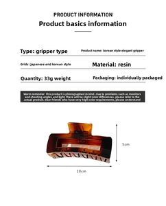 Detailed dimensions of amber resin shark hair claw clip showing 10cm length and 33g weight